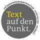 Grauer Kreis mit Text: "Text auf den Punkt." und umrandendem Slogan.