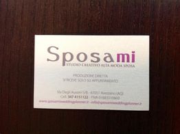 Biglietto da visita "Sposami" su sfondo scuro, studio creativo alta moda per spose.