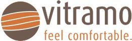 Logo von Vitramo mit Slogan "feel comfortable" und grafischem Kreis mit orangen Linien.