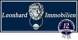 Logo von Leonhard Immobilien mit Löwenkopf und Jubiläumsabzeichen für 12 Jahre.