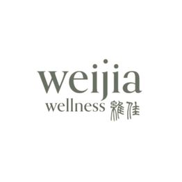 Logotipo de "Weijia Wellness" con texto en caracteres chinos debajo. Fondo blanco.