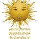 Goldene Sonne mit Gesicht, Text: "Zentrum für Ihre Gesichtsästhetik, Implantologie, Zahnheilkunde".