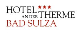 Logo des Hotels "An der Therme" in Bad Sulza. Drei rote Sterne über dem Wort "Therme".