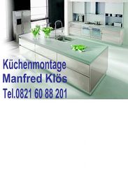 Küche mit Insel und Geräten; Text: Küchenmontage Manfred Klös, Tel. 0821 60 88 201.
