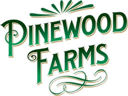 Stylized green text logo reading "Pinewood Farms" with decorative flourishes.