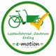 Grünes Lastenfahrrad mit gelbem Haken und Text: Lastenfahrrad-Zentrum Erding, e-motion.
