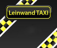 Schwarzer Hintergrund mit gelbem Schild "Leinwand TAXI" und gelb-schwarzen Karomustern.