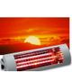 Elektrischer Heizstrahler vor Sonnenuntergangshimmel.