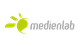 Logo mit grünem Blatt-Symbol und grauem Schriftzug "medienlab". Transparenter Hintergrund.