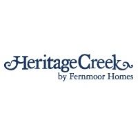 Heritage Creek by Fernmoor Homes logo with elegant dark blue text on a white background.