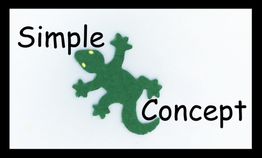 Grüner Gecko aus Papier auf weißem Hintergrund, umgeben von den Worten "Simple" und "Concept".