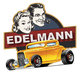 Retro-Schriftzug "EDELMANN" mit lächelndem Paar im Hintergrund und gelbem Oldtimer im Vordergrund.