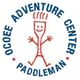 Cartoon stick figure with "Ocoee Adventure Center Paddleman" text in a circle around it.