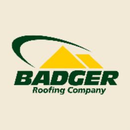 Logo of Badger Roofing Company with green text and a yellow roof design.