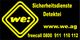 Gelbes Logo "we:" mit Text zu Sicherheitsdiensten und Detektei, Webadresse und Gratisnummer.