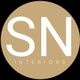"SN Interiors logo in white text on a beige circular background."