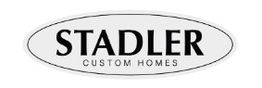 Logo of Stadler Custom Homes; black text inside an oval shape on a white background.