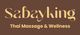 "Sabayking: Thai Massage & Wellness, brauner Hintergrund, gelbe Schrift"
