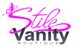 Logo "Stile Vanity Boutique" con scritta in rosa e grigio, e farfalla stilizzata.