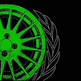 Grünes Autoreifen-Design mit Blätterkranz auf schwarzem Hintergrund.