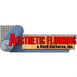 Logo for "Aesthetic Flooring & Hard-Surfaces, Inc." with a rolled flooring design.