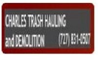 Sign for Charles Trash Hauling and Demolition with contact number (727) 831-4507.