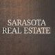 Text "SARASOTA REAL ESTATE" on a textured dark background.
