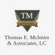Triangle logo with "TM & Associates"; text: Thomas E. McIntire & Associates, LC.