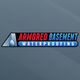 Logo of Armored Basement Waterproofing with a water drop and metallic pattern.