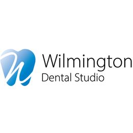 Logo of Wilmington Dental Studio with a blue tooth icon on the left.
