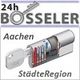 Ein Schlüsselzylinder mit Text: "24h Bosseler Aachen StädteRegion".