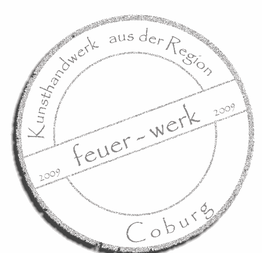 Stempel mit Text: "Kunsthandwerk aus der Region Coburg, feuer-werk, 2009".