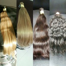 Quatro mechas de cabelo, variando de lisas a onduladas, em tons de loiro a castanho escuro.