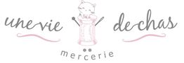 Logo avec chat sur bobine, texte "une vie de chas" et "mercerie" dessous.