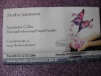 Visitenkarte mit Schmetterlingsmotiv, Studio Jeannette, Kontaktinfos und Adresse in Deutschland.