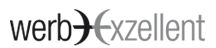 Schriftzug "werbExzellent" mit stilisiertem Fisch-Symbol zwischen den Wörtern in Schwarz und Grau.