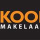 Logo met oranje huispictogram en tekst "Koops Makelaardij" op zwarte achtergrond.