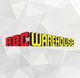 ABC Warehouse logo with bold red and yellow 3D letters on a geometric white background.