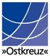 Logo mit blauen, gekrümmten Linien und Text "Ostkreuz" darunter.