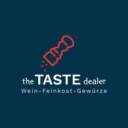Logo mit rotem Gewürzstreuer und Text: "the TASTE dealer, Wein-Feinkost-Gewürze".