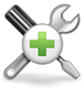 Werkzeug-Symbol mit Schraubendreher und Schraubenschlüssel hinter grünem Kreuz.