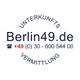 Berlin49.de Logo mit Telefonnummer und Text "Unterkunftsvermittlung" in blauem Kreis.