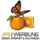 Schmetterling auf Orangenwürfel neben halber Orange, Text: "JPS Werbung, Design, Internet & Multimedia".