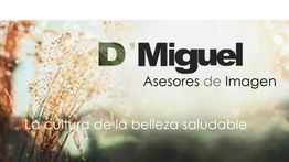 Texto: "D'Miguel Asesores de Imagen. La cultura de la belleza saludable". Fondo natural difuminado.