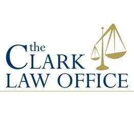 The Clark Law Office logo with blue text and gold scales of justice icon.