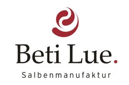 Logo von Beti Lue, Salbenmanufaktur, mit stilisiertem roten Symbol darüber.