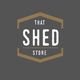 Logo with "That Shed Store" text inside a hexagonal frame on a dark background.