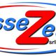 Logo di "esseZeta srl" con scritta blu e rossa in un ovale bianco bordato di rosso e blu.