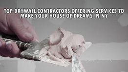 Hand applying drywall paste with text: "Top drywall contractors in NY for your dream house."