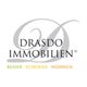 Logo von Drasdo Immobilien mit dem Slogan "Besser. Schöner. Wohnen".
